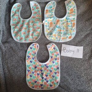 11.    3 PACK OF BIBS